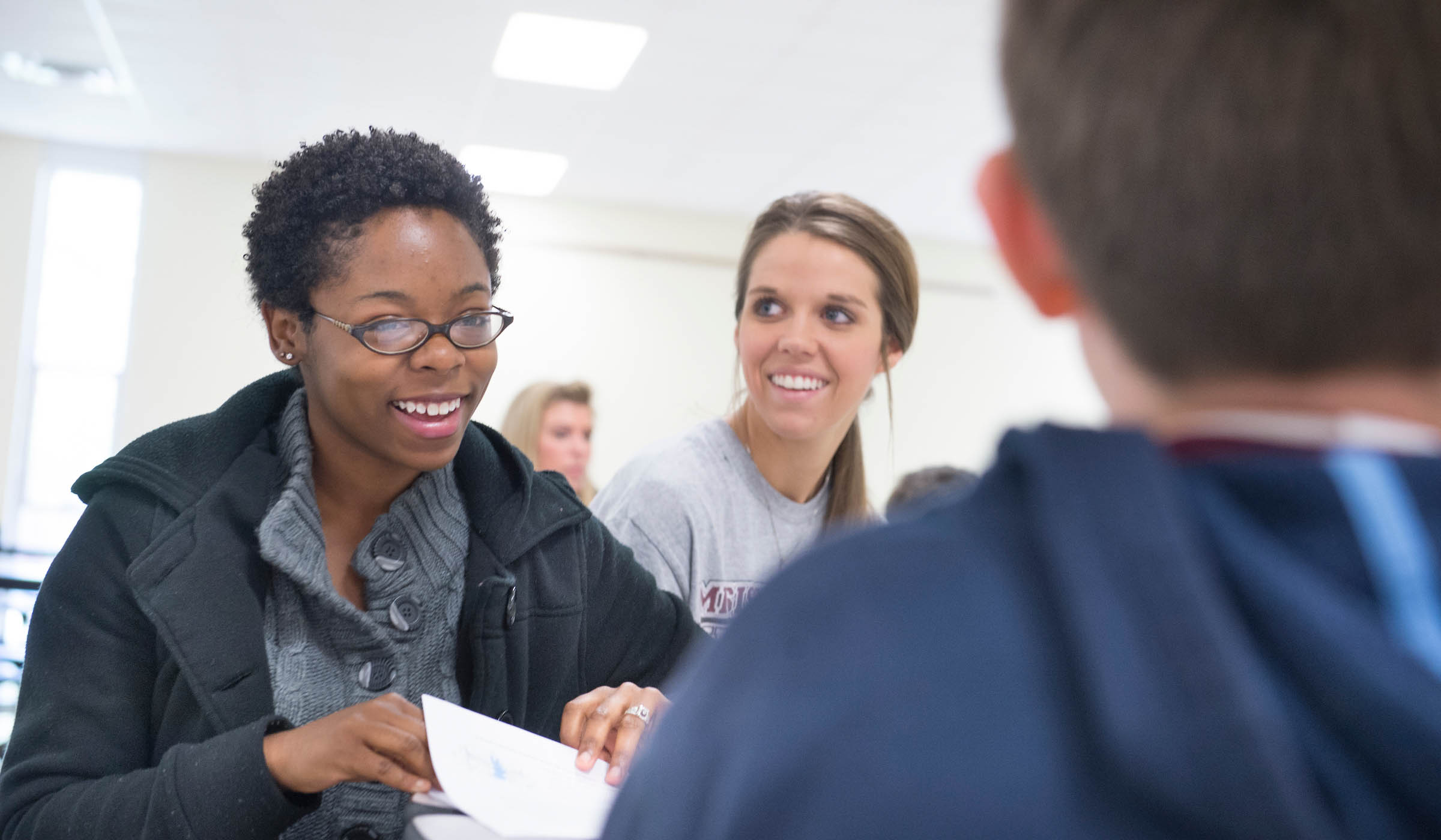 Teacher talking to student